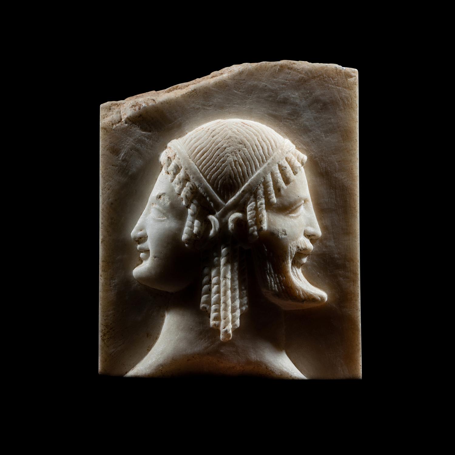 A Neoclassical Marble Relief Fragment with Janus
