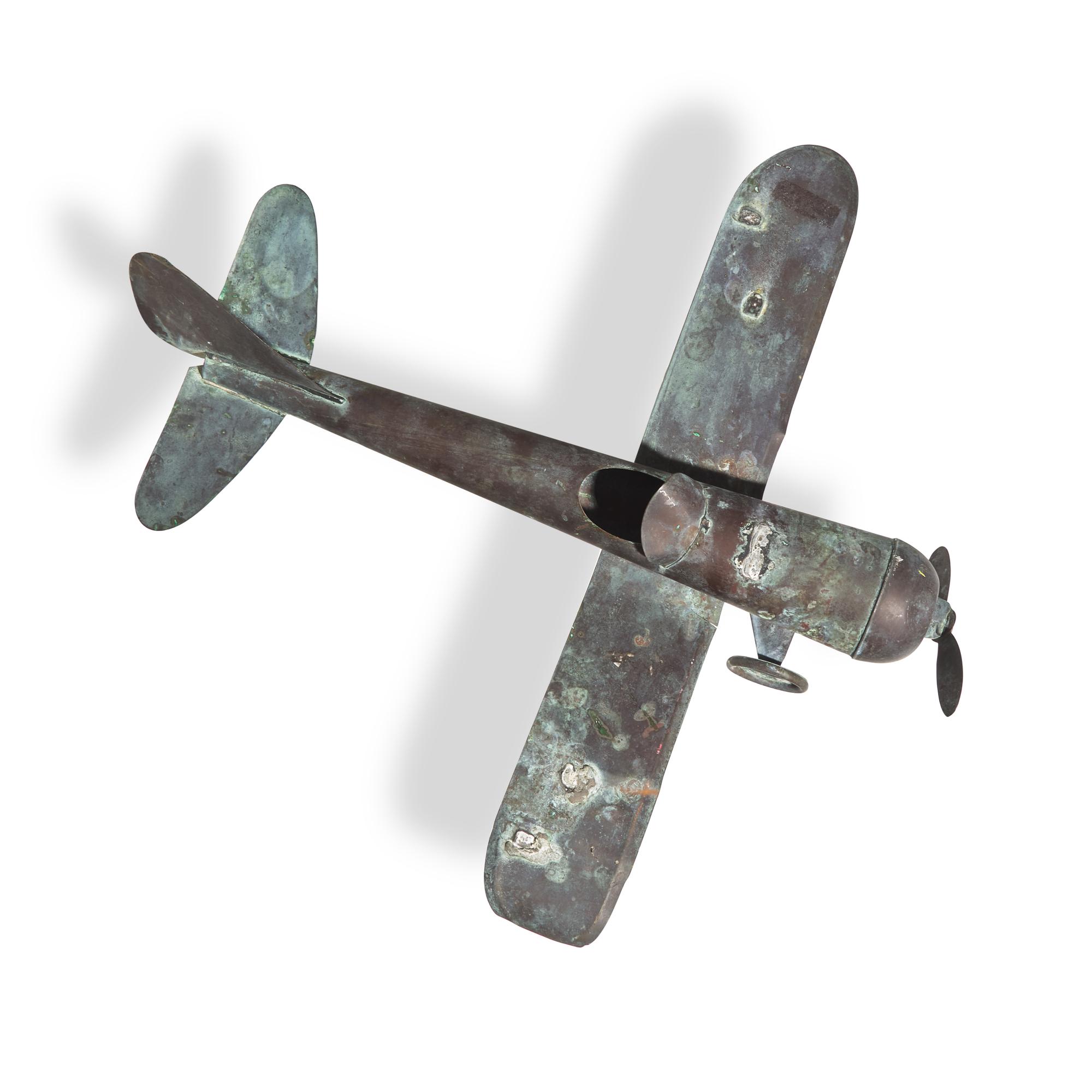 A Patinated Copper Airplane Weathervane