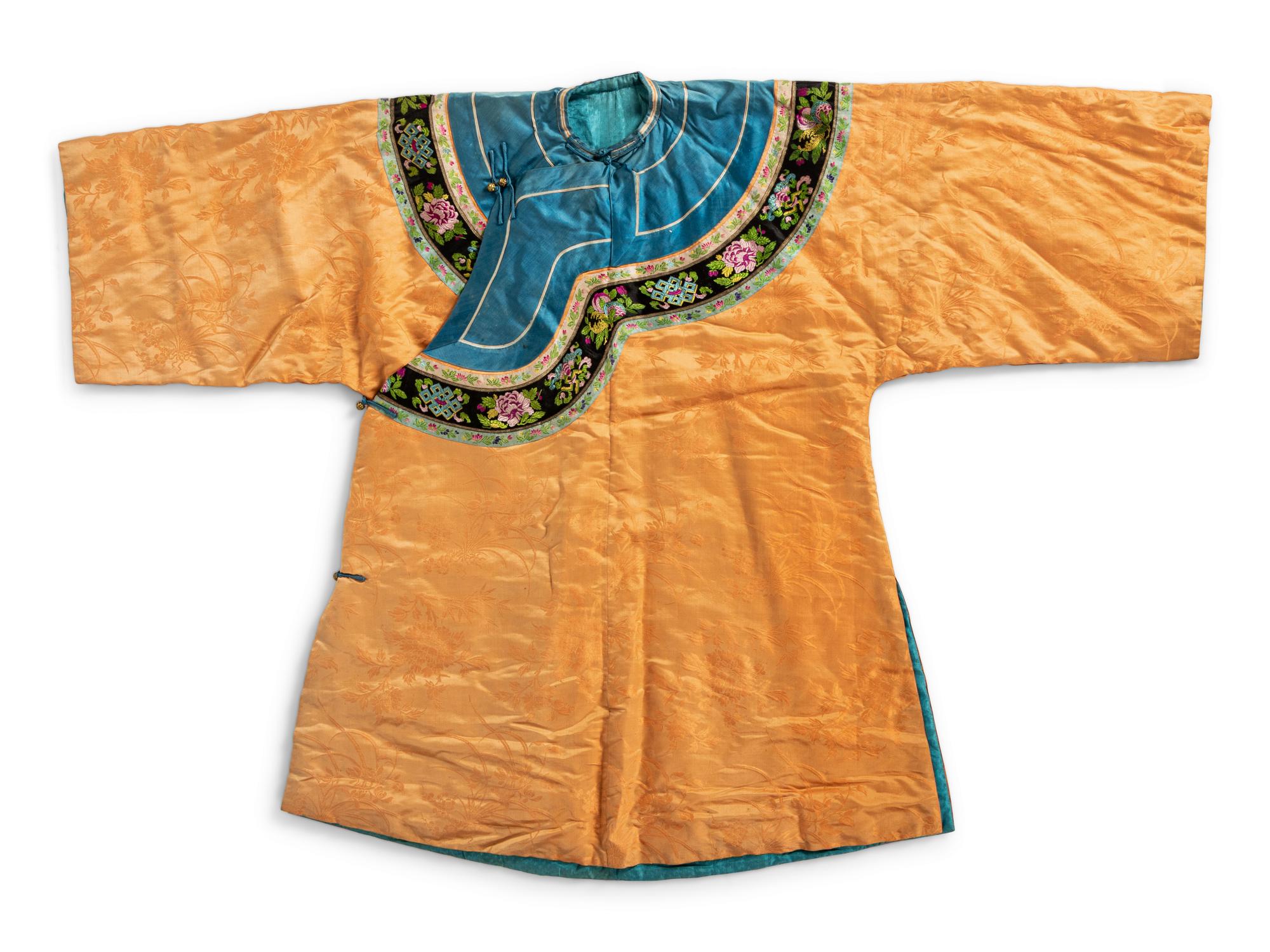 A Chinese Lady's Embroidered Silk Jacket and A Yellow Ground Silk Apron Skirt
