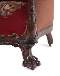 A Rococo Revival Carved Walnut Three-Piece Seating Suite in the Style of Karpen