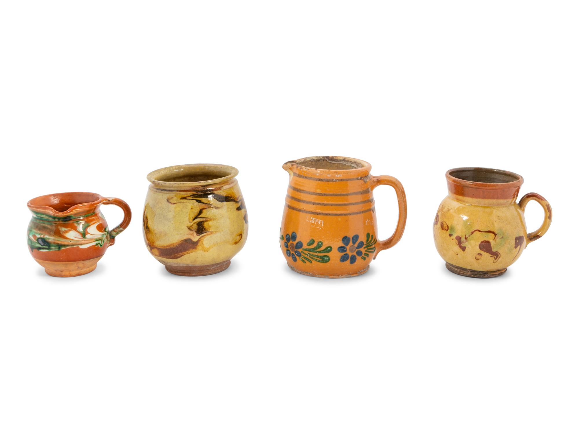 Eight European Pottery Pitchers