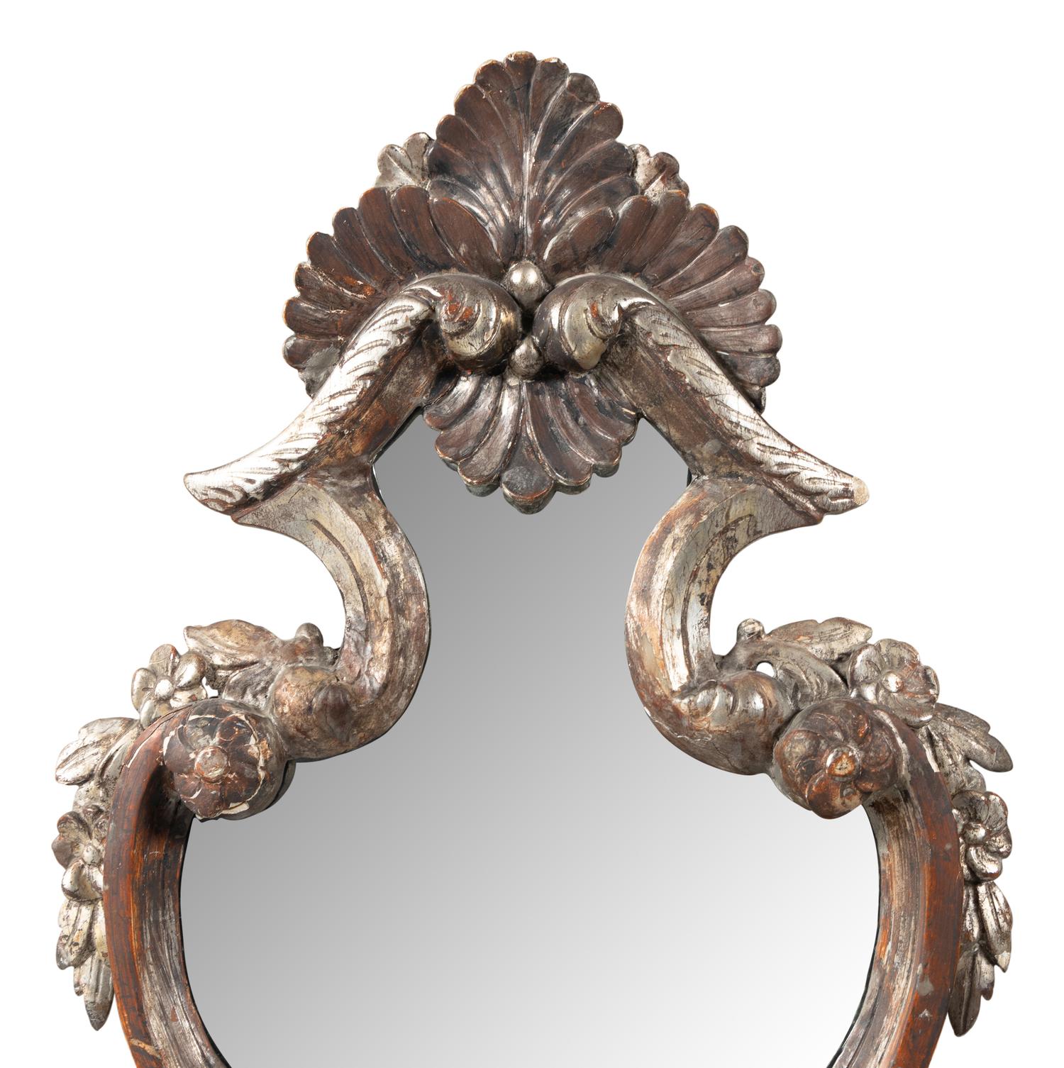 A Pair of Italian Silvered Wood Mirrors