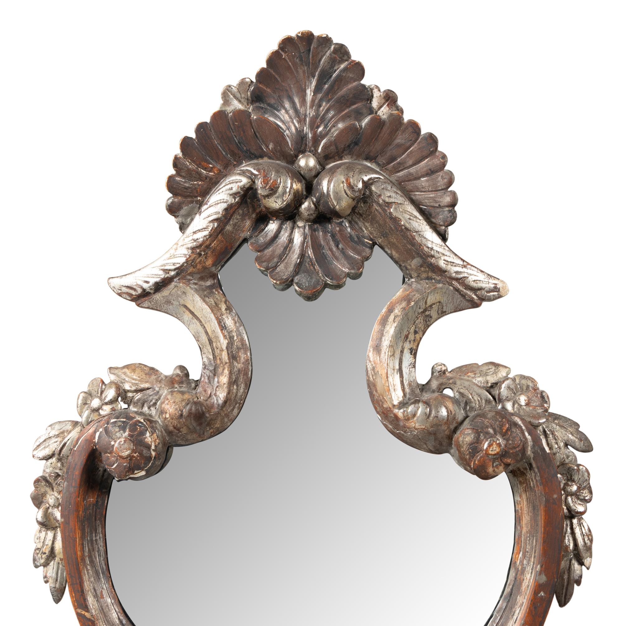 A Pair of Italian Silvered Wood Mirrors