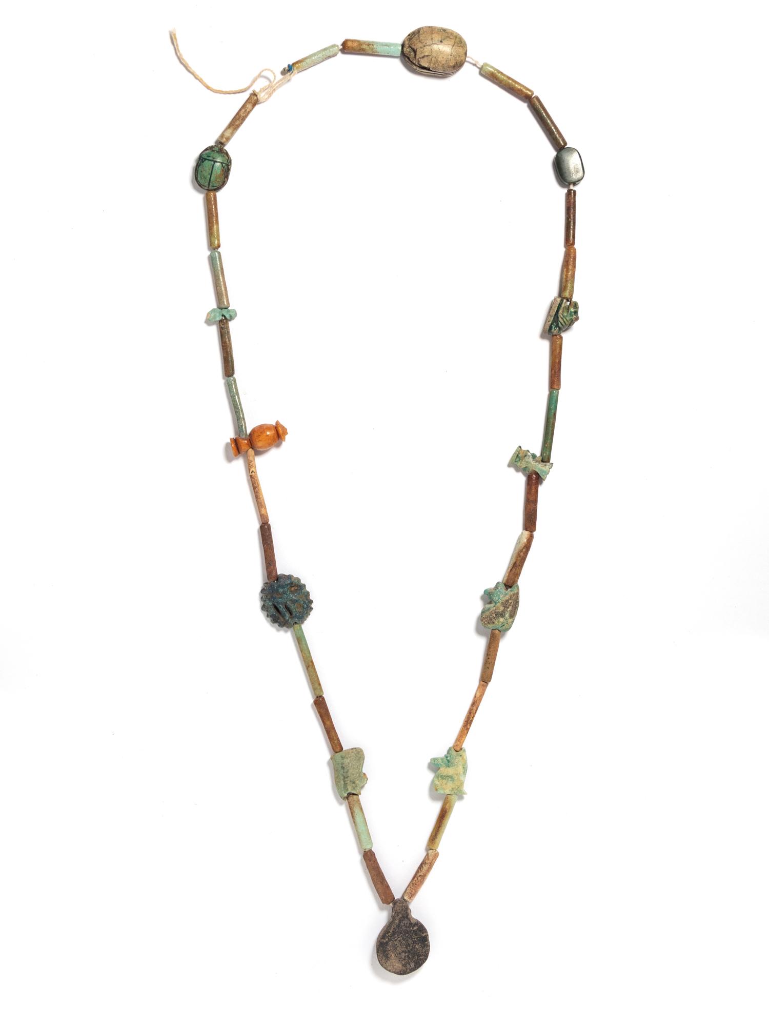An Egyptian Faience Bead and Amulet Necklace