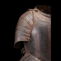 A 17th Century German Etched and Painted Half Suit of Armor
