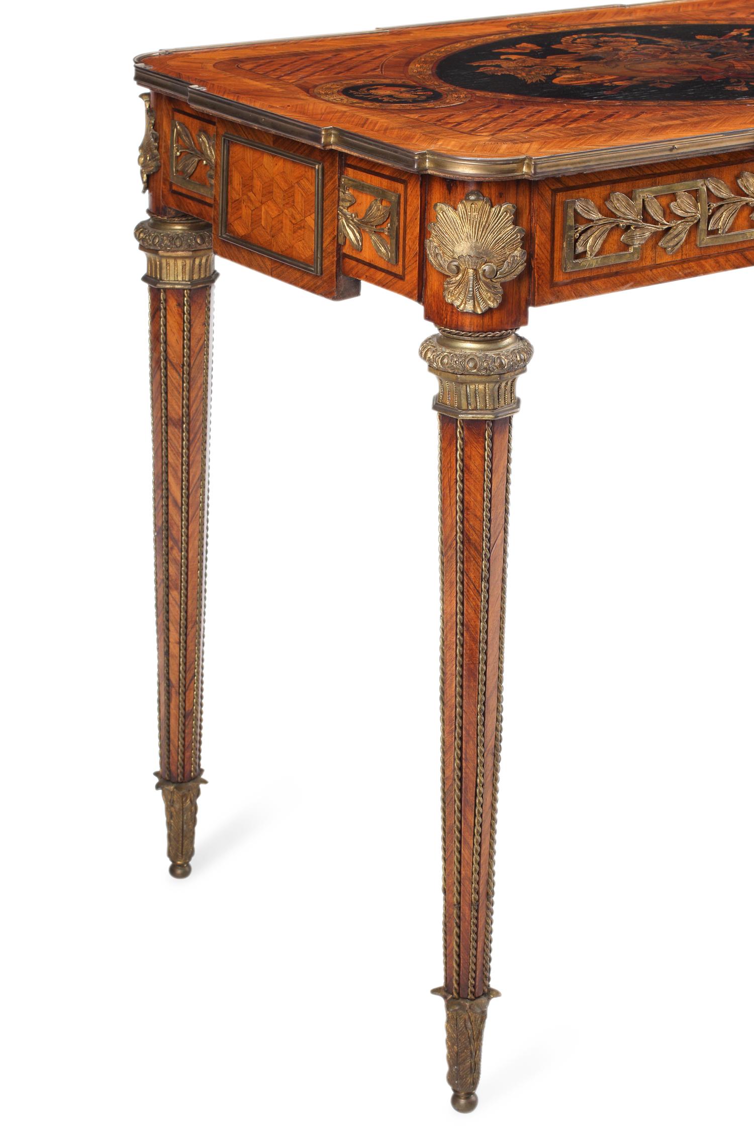 A Louis XVI Style Marquetry Center Table