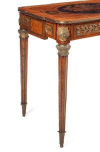 A Louis XVI Style Marquetry Center Table