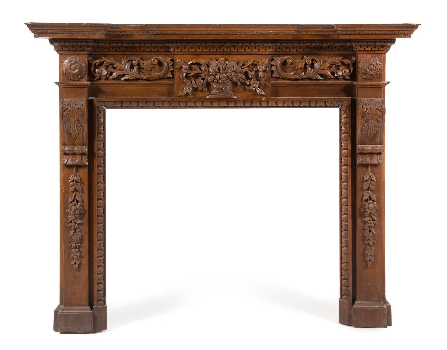 A Neoclassical Carved and Stained Pine Mantel Height 54 x width 68 1/2 x depth 9 inches. — MID-20TH CENTURY