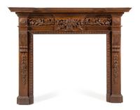 A Neoclassical Carved and Stained Pine Mantel Height 54 x width 68 1/2 x depth 9 inches. — MID-20TH CENTURY
