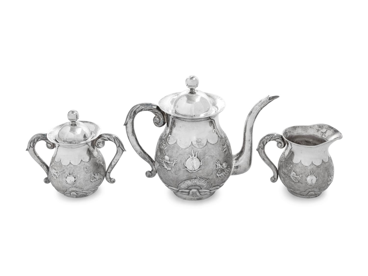 A Japanese Silver Three-Piece Tea Service