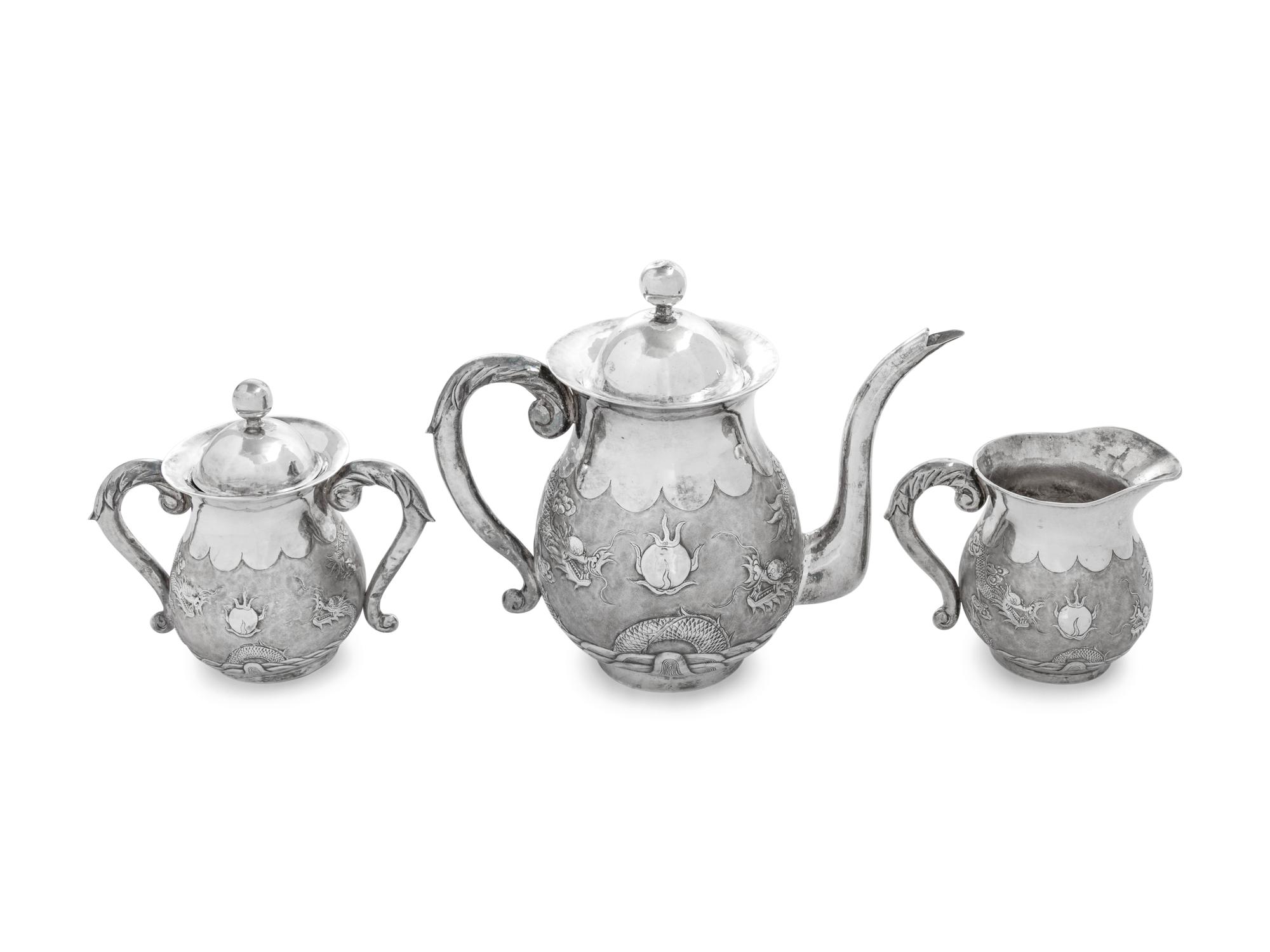 A Japanese Silver Three-Piece Tea Service