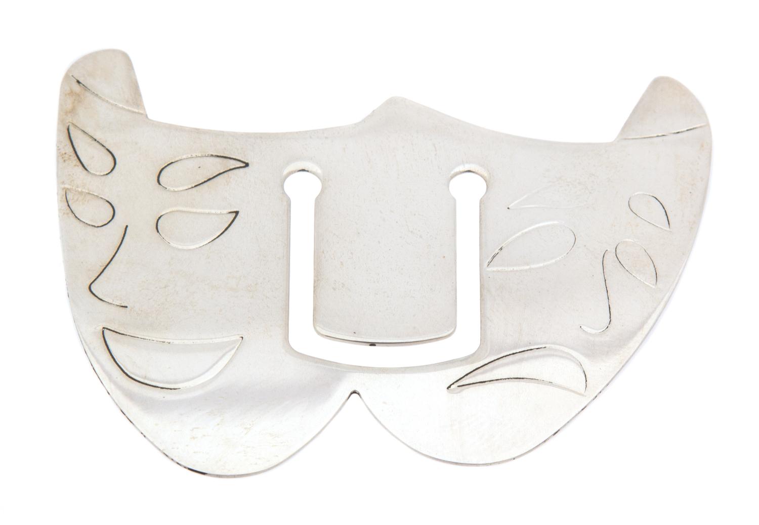 A Tiffany & Co. Sterling Silver Theater Mask Bookmark, 2.25" x 1.75".
