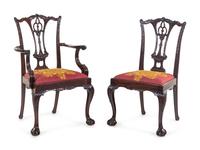 A Set of Ten George III Style Carved Mahogany Dining Chairs