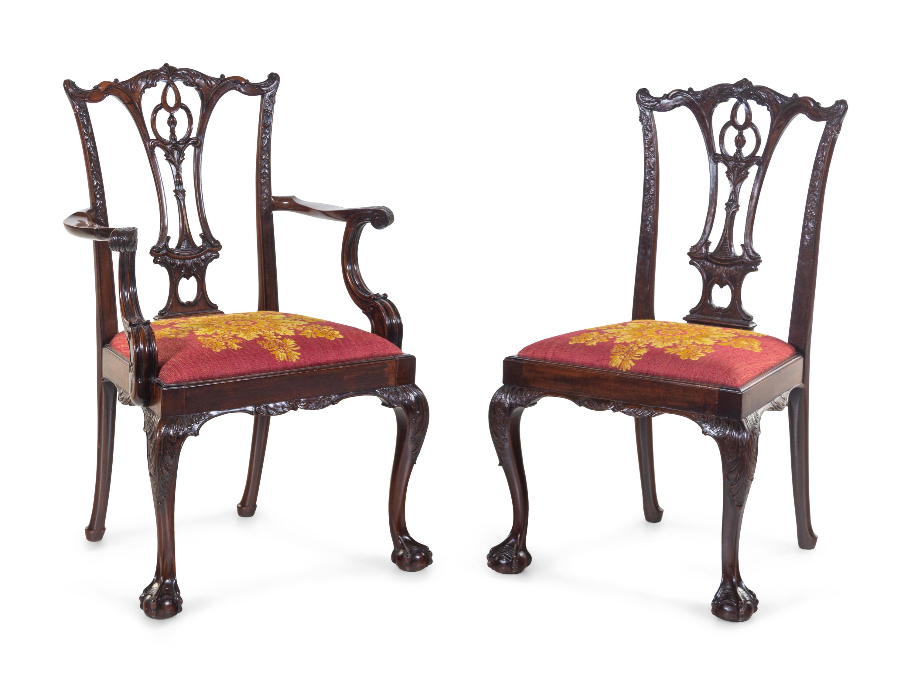 A Set of Ten George III Style Carved Mahogany Dining Chairs