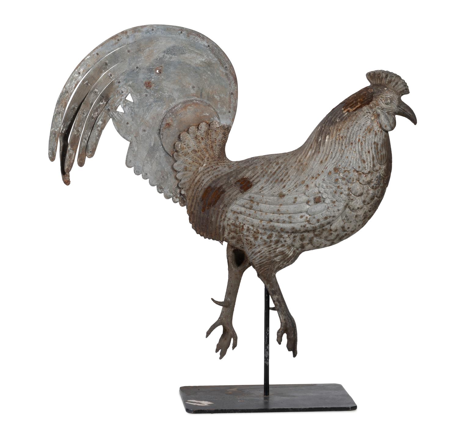 A Cast Iron and Tin Rooster Weathervane and Tin Heron