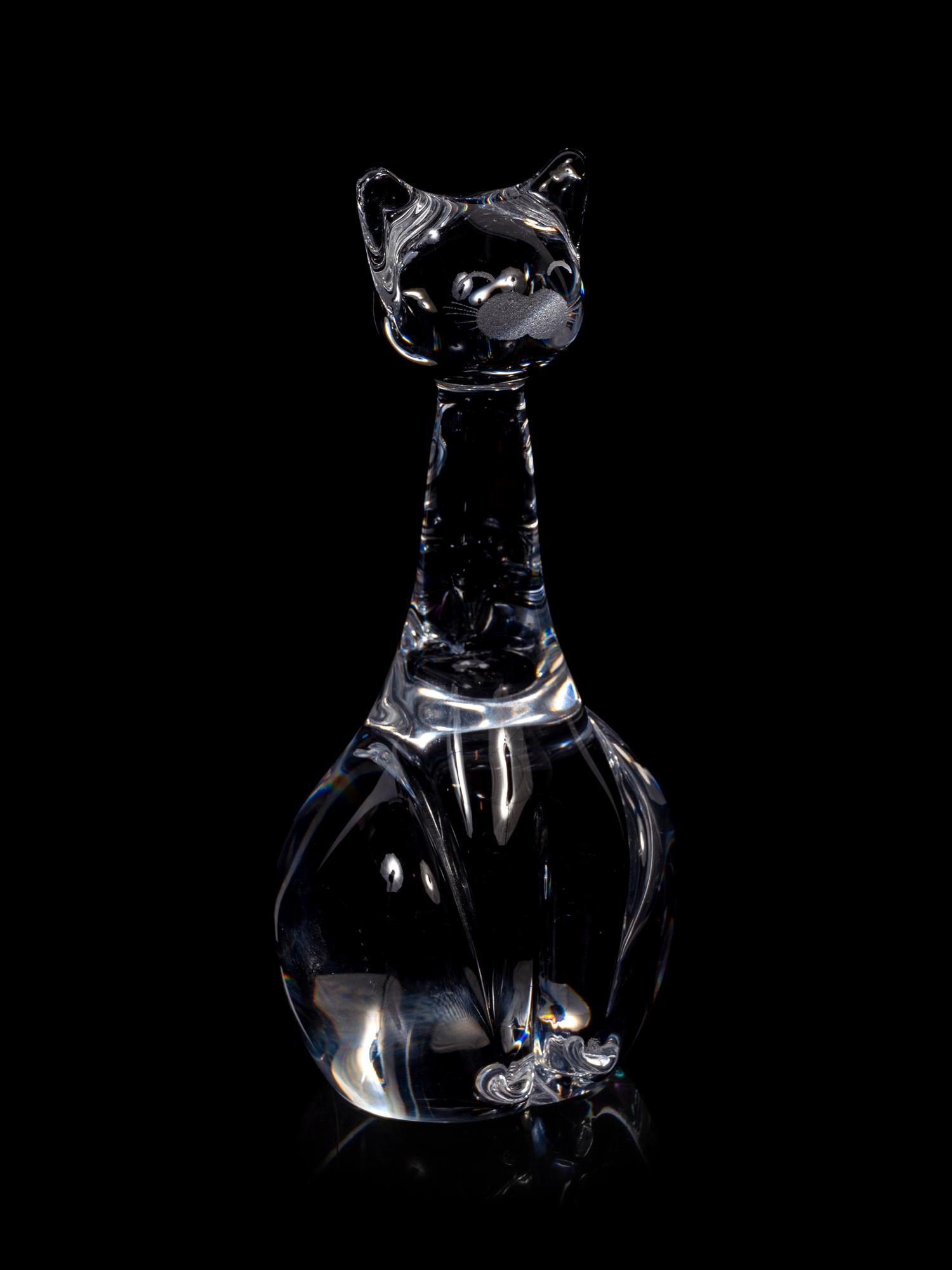 Three Glass Paperweights and a Dish