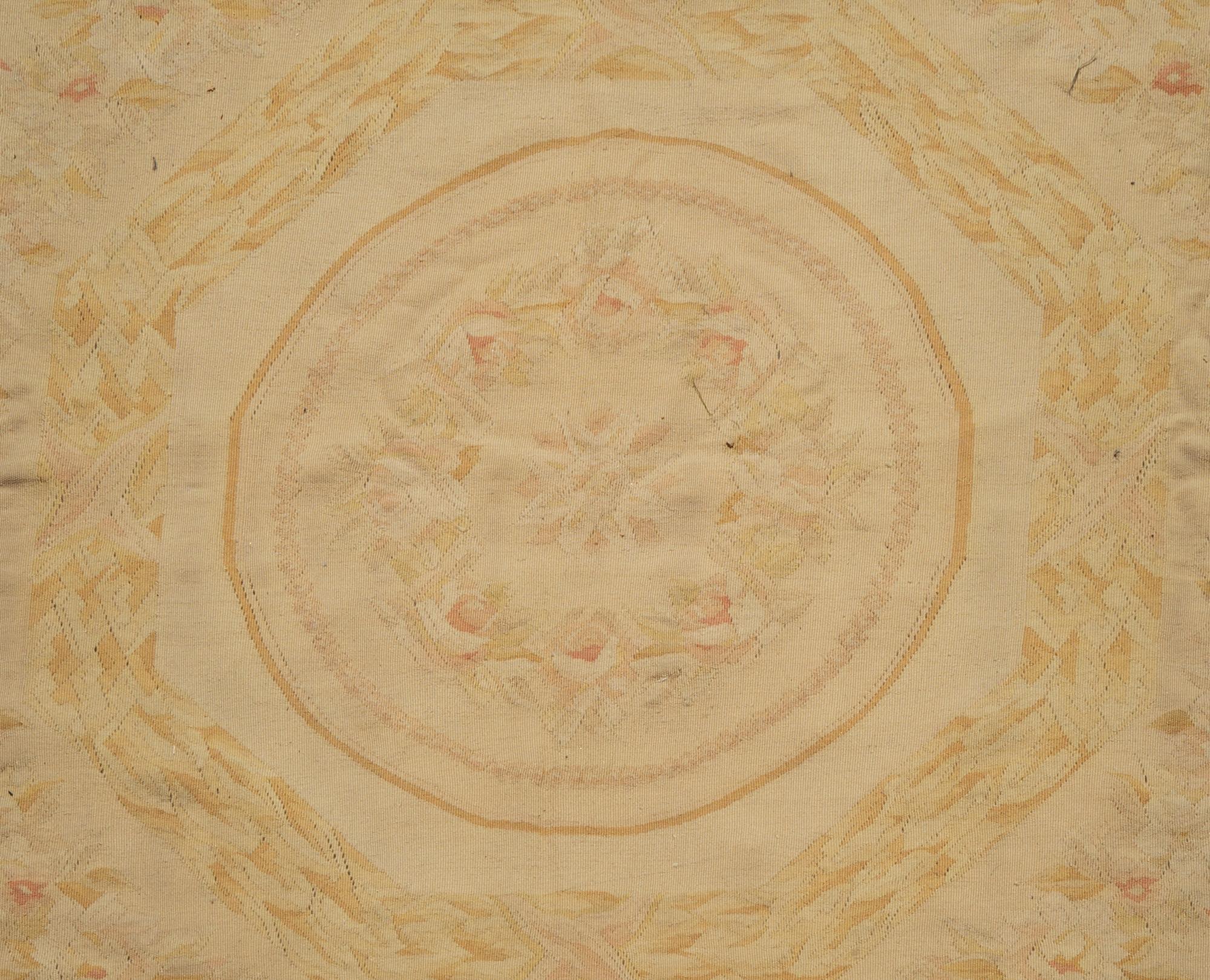An Aubusson Style Wool Rug — 20th Century