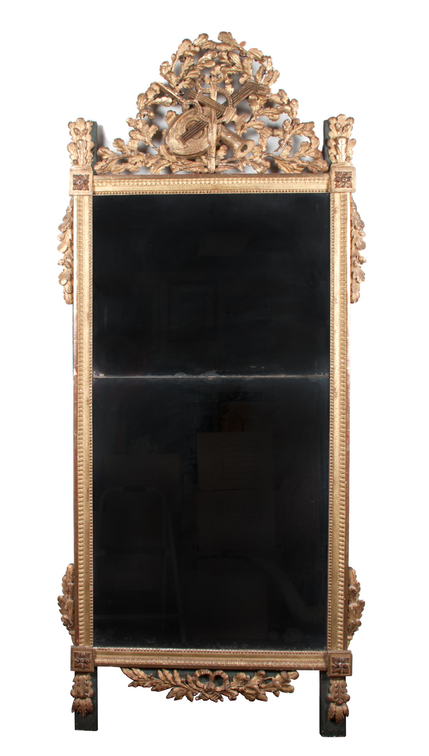A Louis XVI Giltwood Pier Mirror Height 78 1/2 x width 34 1/2 inches.