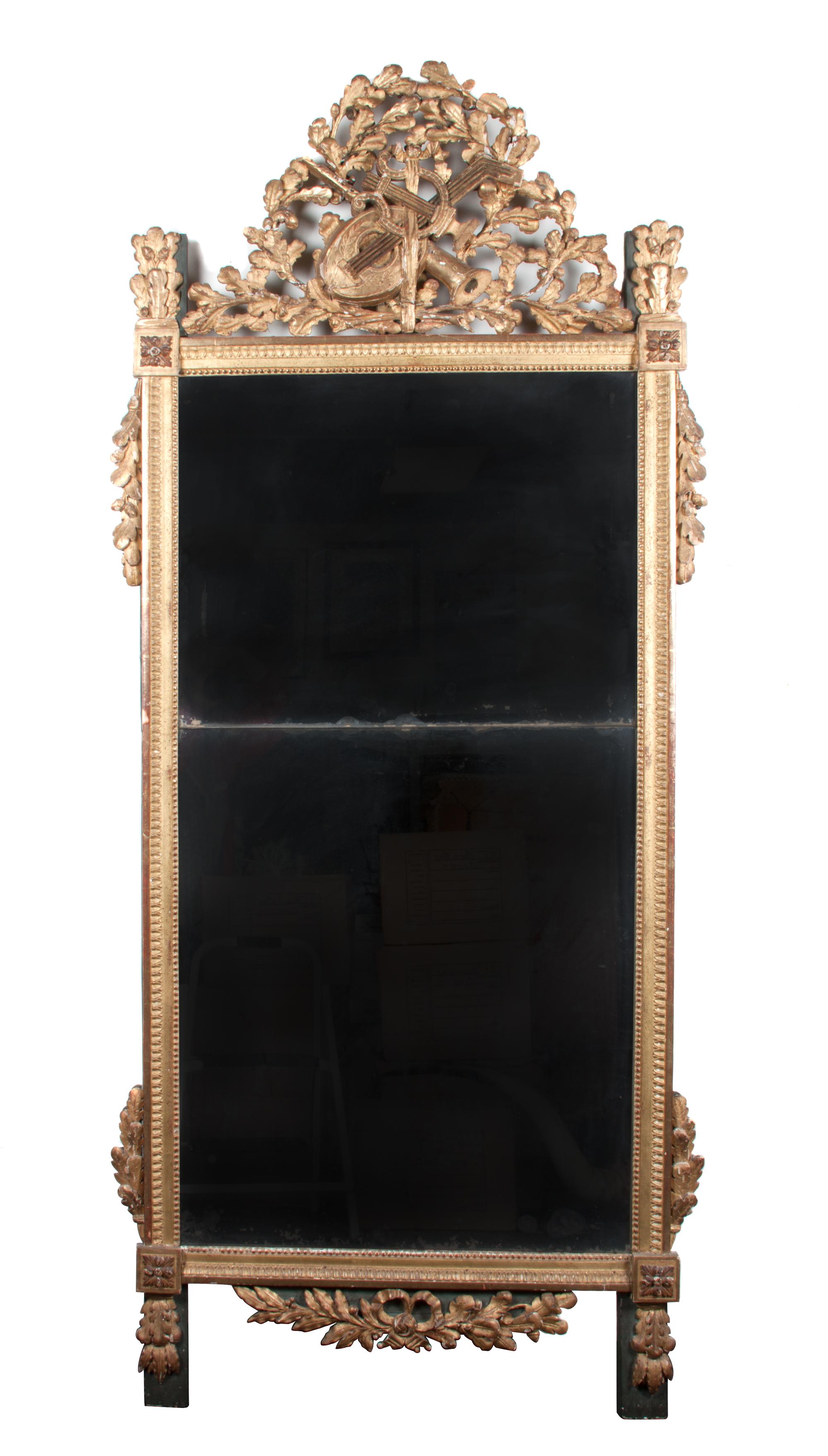 A Louis XVI Giltwood Pier Mirror Height 78 1/2 x width 34 1/2 inches.