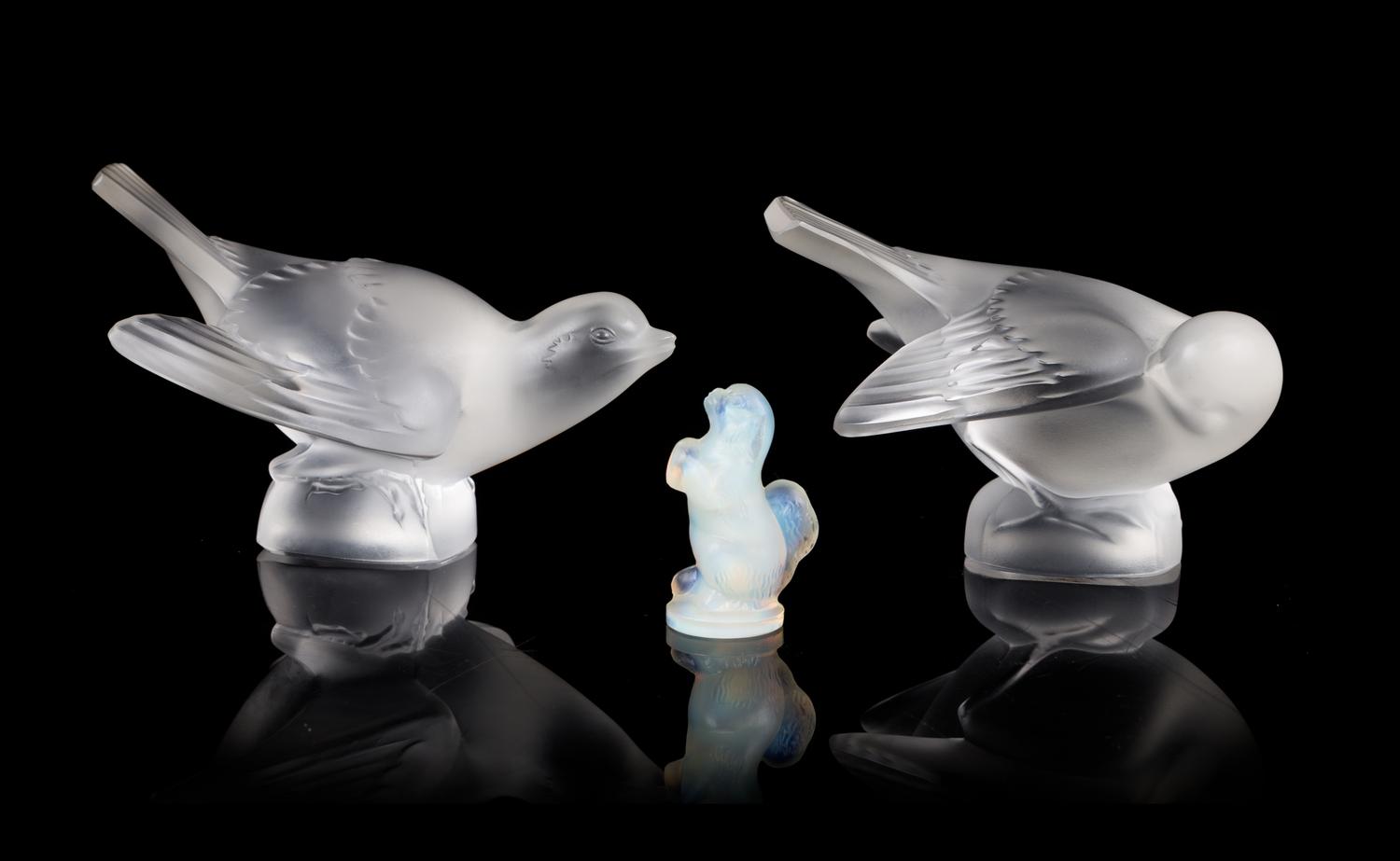 Lalique, two molded and frosted glass figures, depicting birds, together with a Sabino glass dog