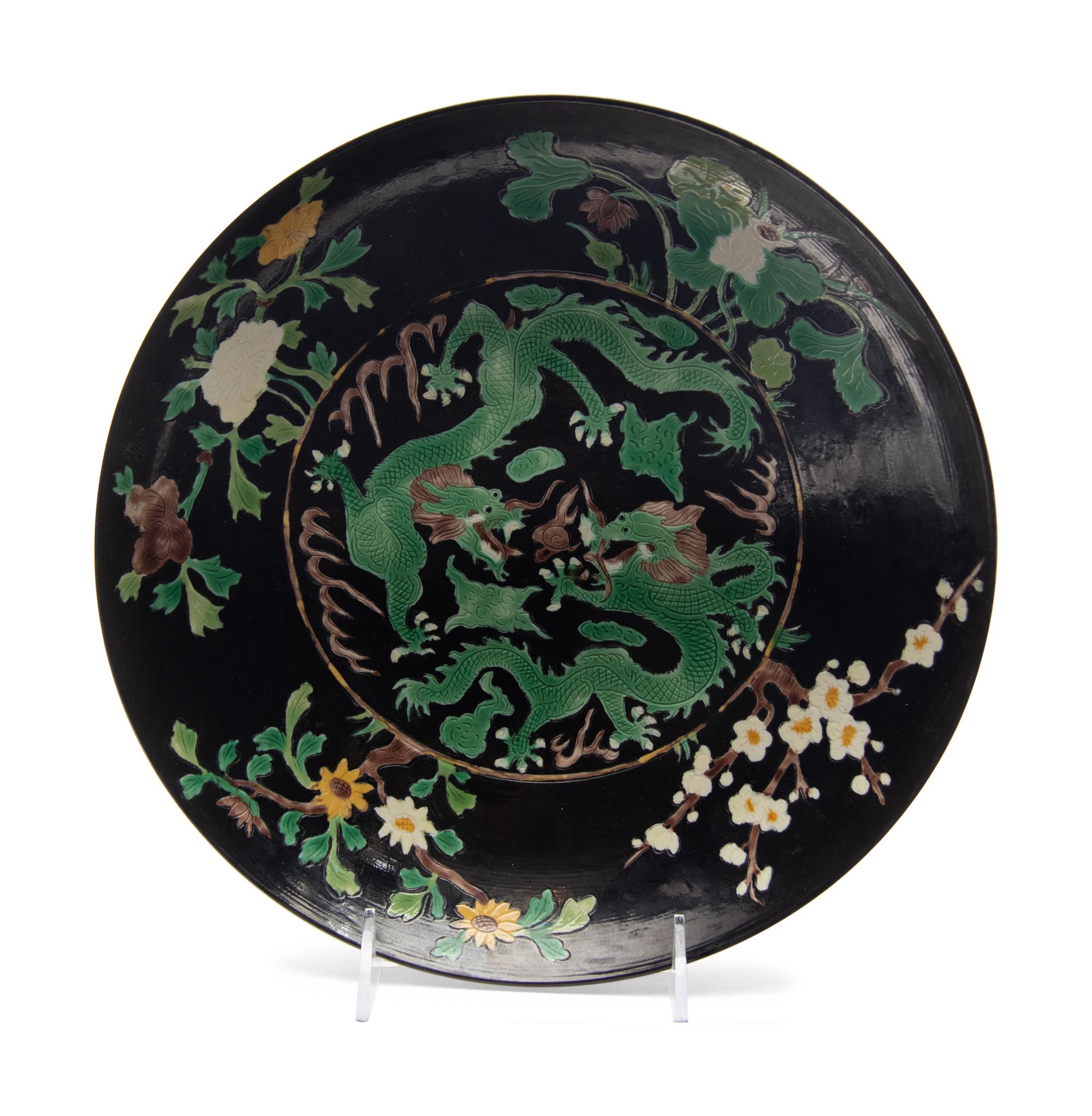 A Chinese Black Ground Famille Verte Porcelain Plate