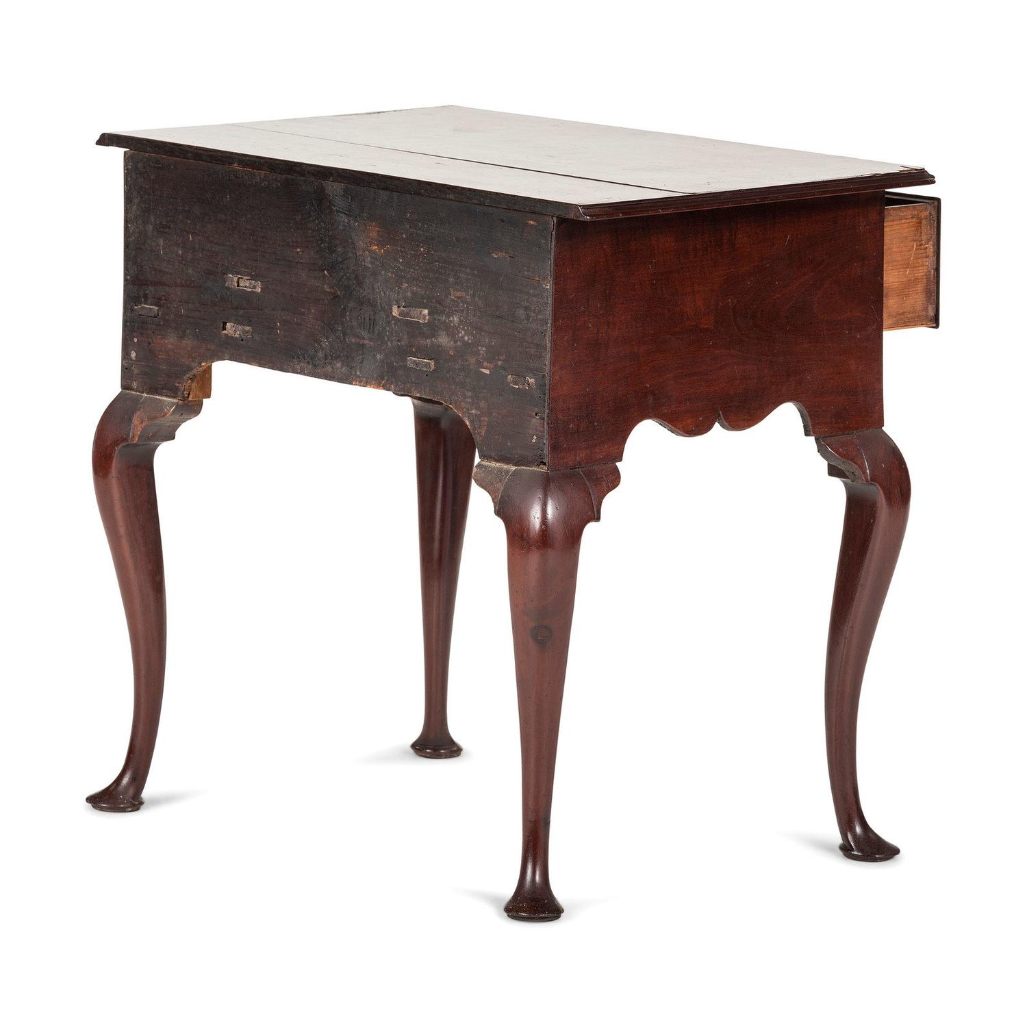 A Queen Anne Figured Mahogany Pad Foot Dressing Table
