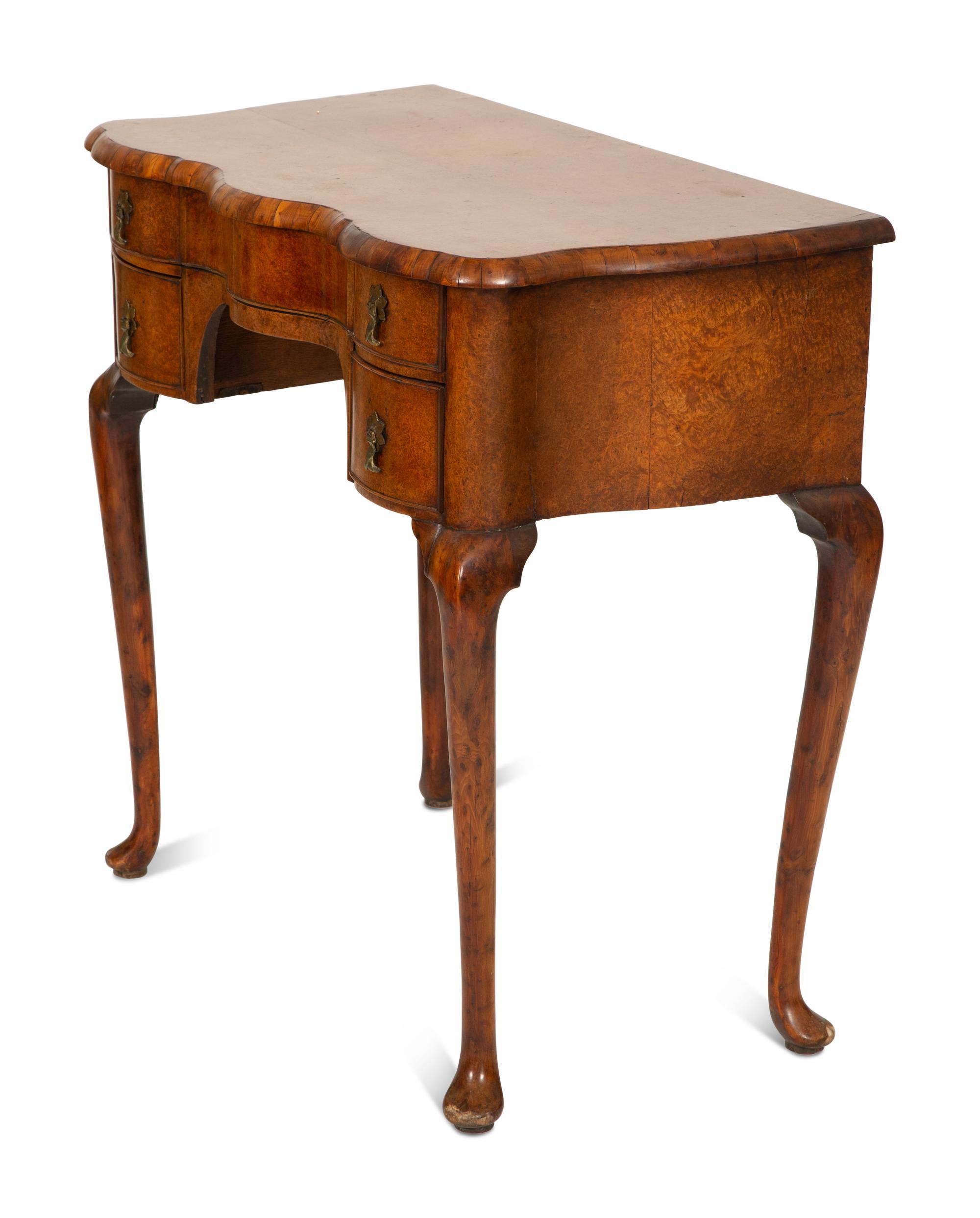 A George I Burl Walnut Dressing Table