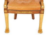 An Empire Gilt Bronze Mounted Mahogany and Parcel Gilt Fauteuil de Bureau