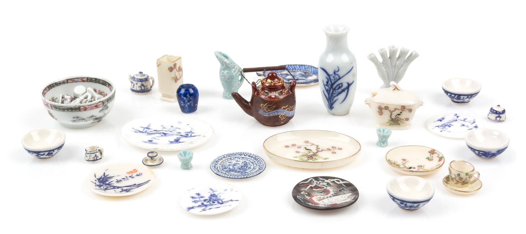 A Collection of Chinese and Japanese Style Porcelain Table Articles Height of tallest vase 1 3/8 inches. — Various Makers