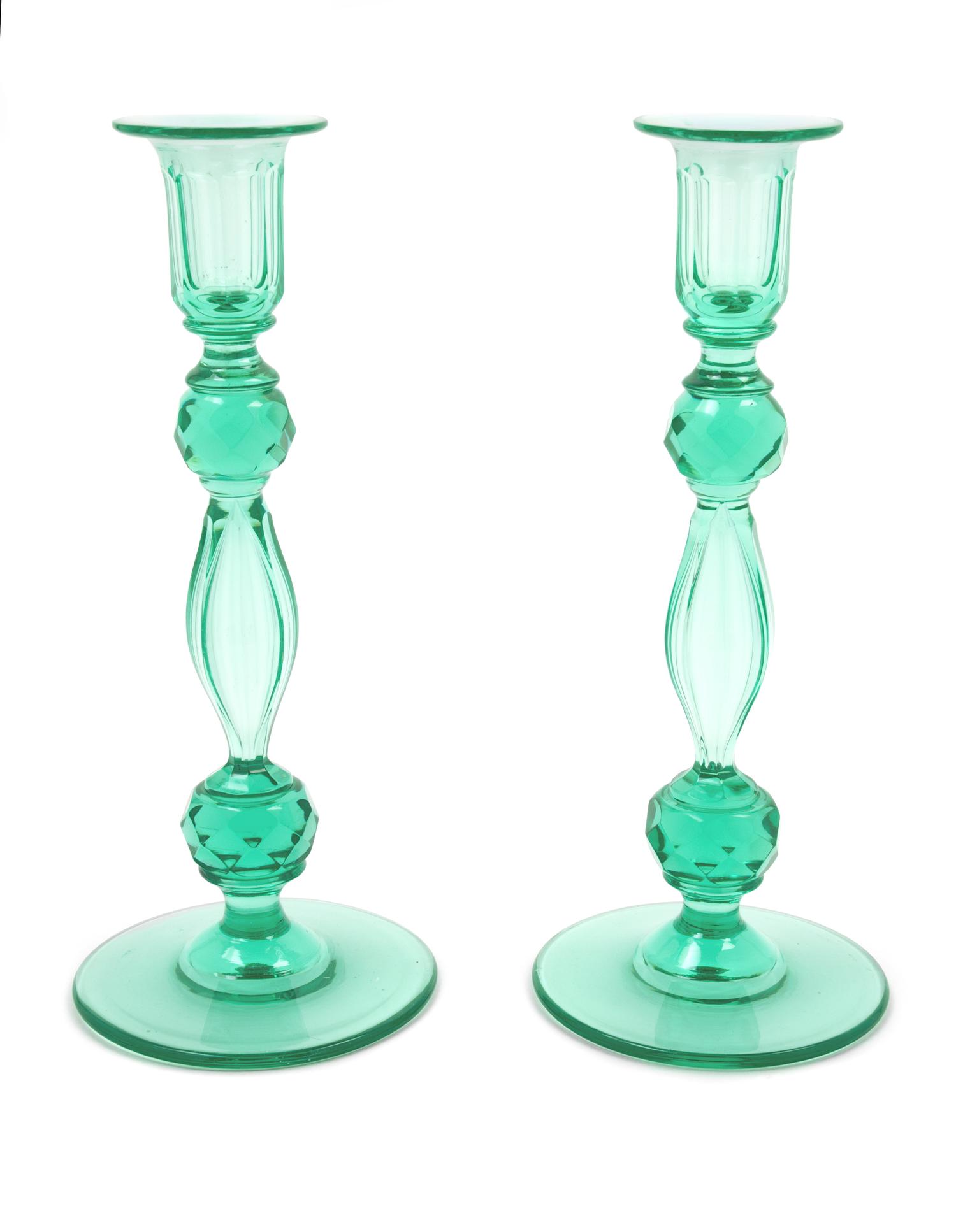 Style of Steuben, (American, 20th Century), pair of green candlesticks