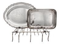 A Collection of Silver-Plate Serving Articles, 20th Century, comprising three trays, two covered sauce tureens and a covered entree.