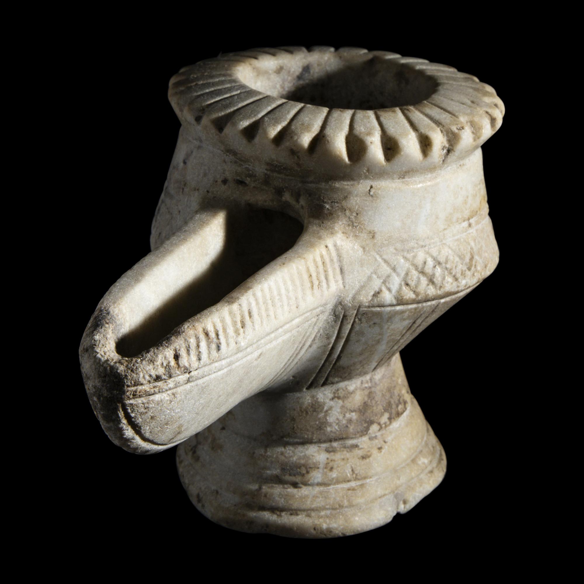 An Islamic Marble Oil Lamp