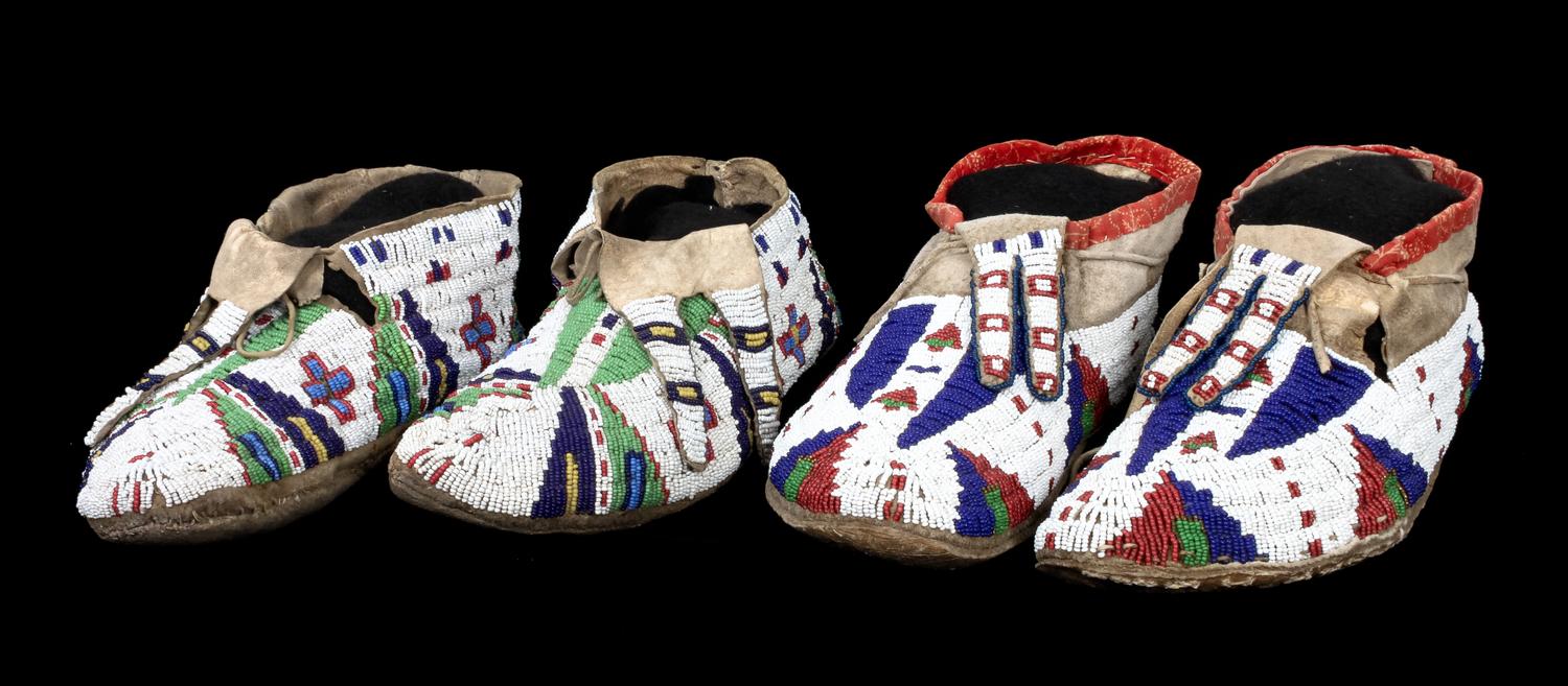 Two Pair of Fully Beaded Sioux Moccasins Length of longest 11 inches. — CIRCA 1890
