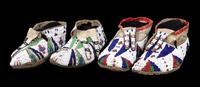 Two Pair of Fully Beaded Sioux Moccasins Length of longest 11 inches. — CIRCA 1890