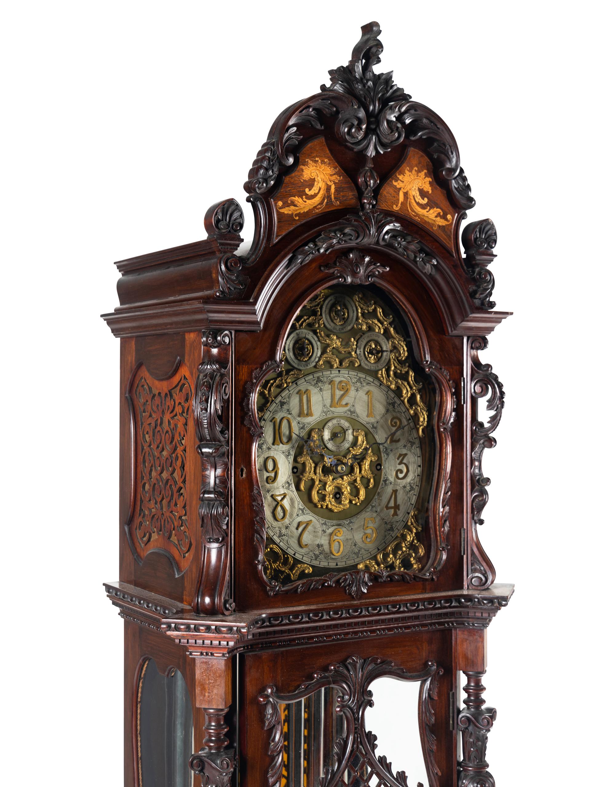 A Victorian Carved Mahogany and Marquetry Nine-Tube Tall Case Clock