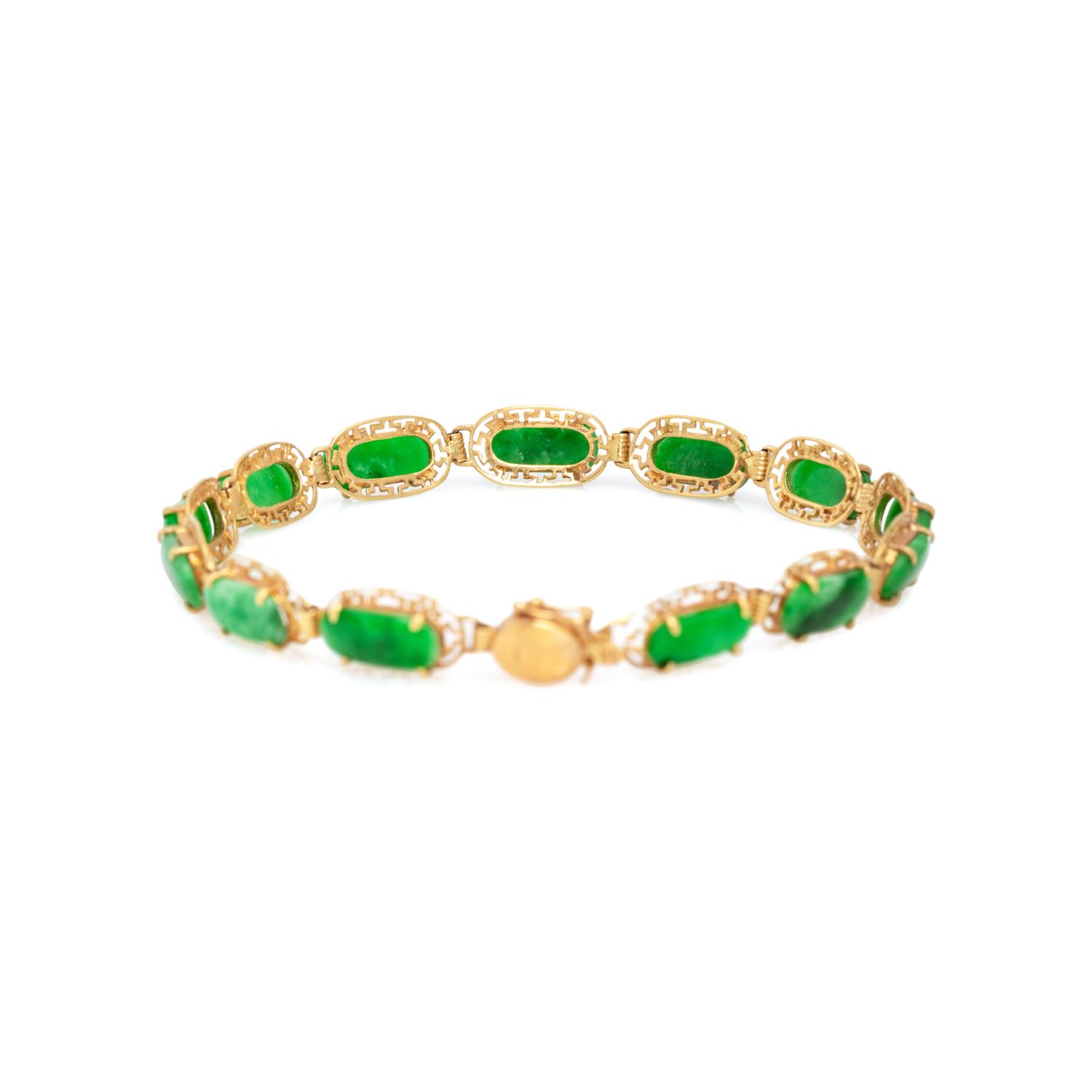 COLLECTION OF YELLOW GOLD AND JADE JEWELRY