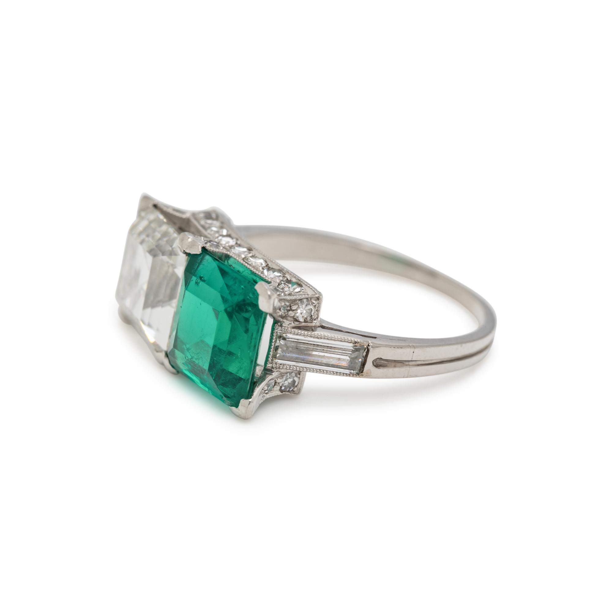 ART DECO, EMERALD AND DIAMOND 'TOI ET MOI' RING