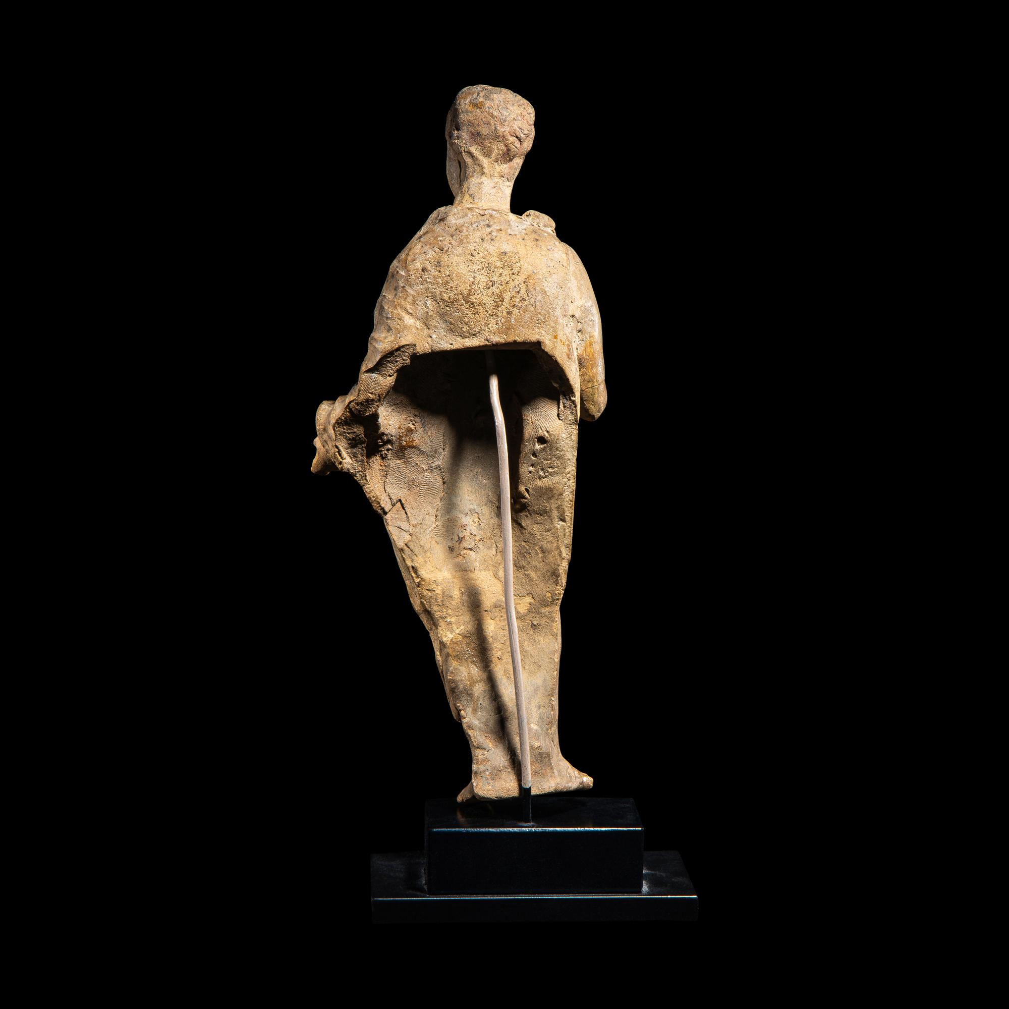 A Roman Terracotta Figure of a Youth