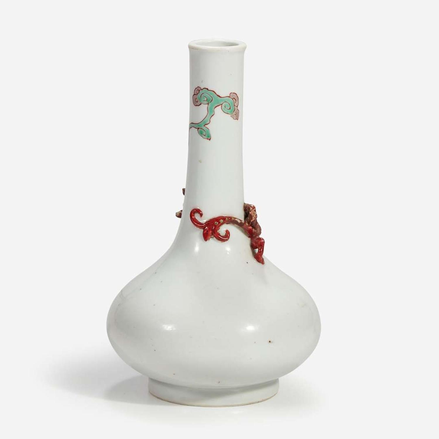 A Chinese porcelain bottle vase with applied coiled dragon Probably 18th century