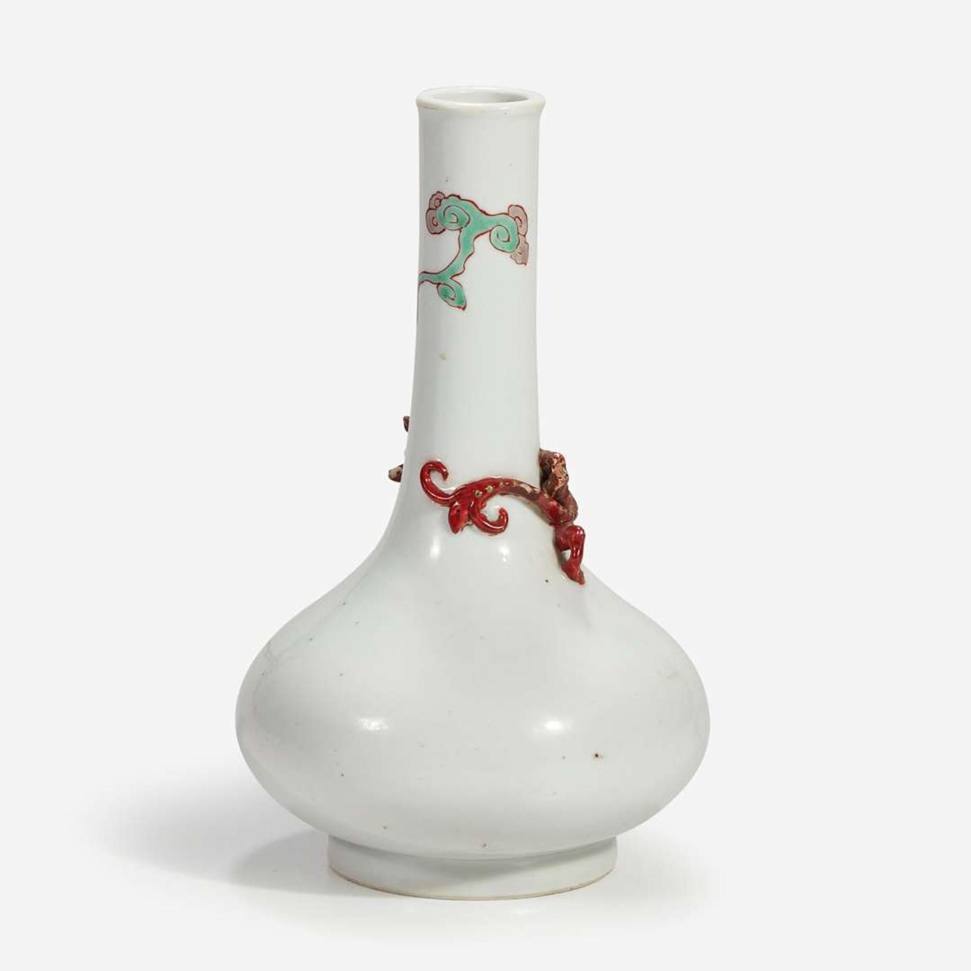 A Chinese porcelain bottle vase with applied coiled dragon Probably 18th century