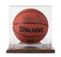 A Hakeem Olajuwon Autographed Basketball Height of display case 12 x width 11 1/2 x depth 12 inches.