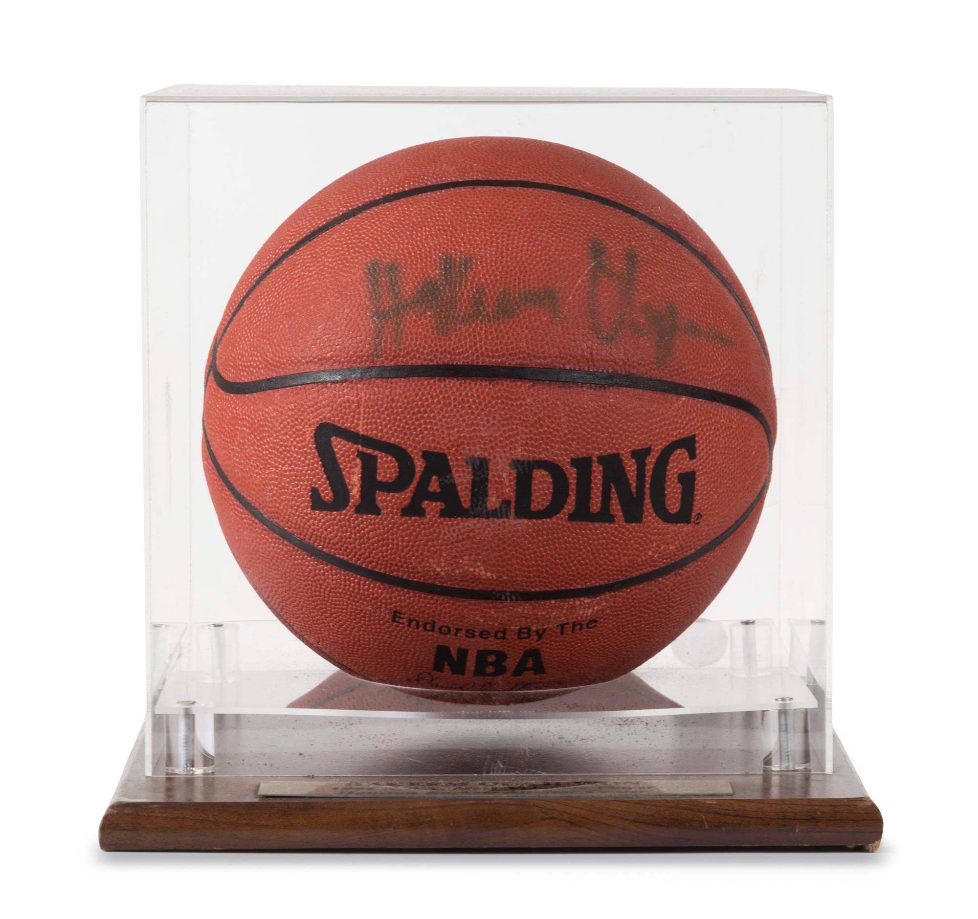 A Hakeem Olajuwon Autographed Basketball Height of display case 12 x width 11 1/2 x depth 12 inches.