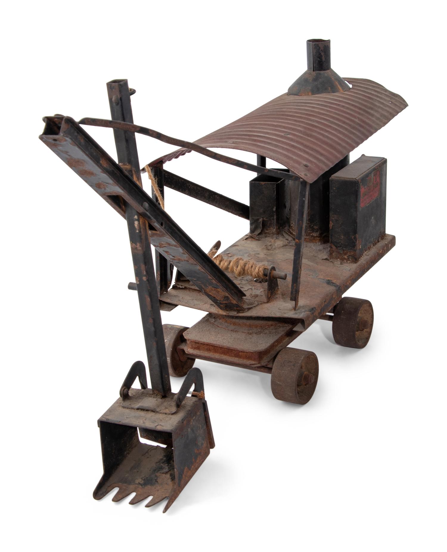 A Group of Five Metal Toys