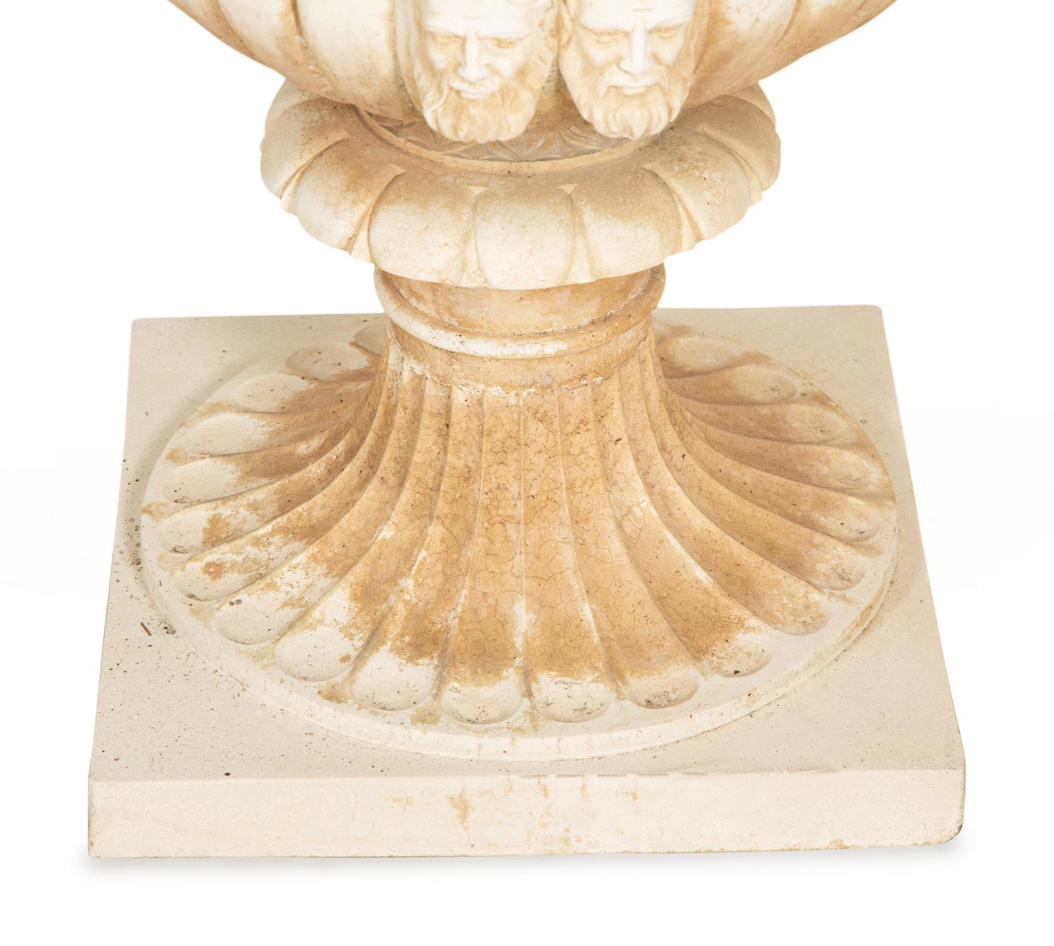 A Pair of Cast Stone Campana Urns