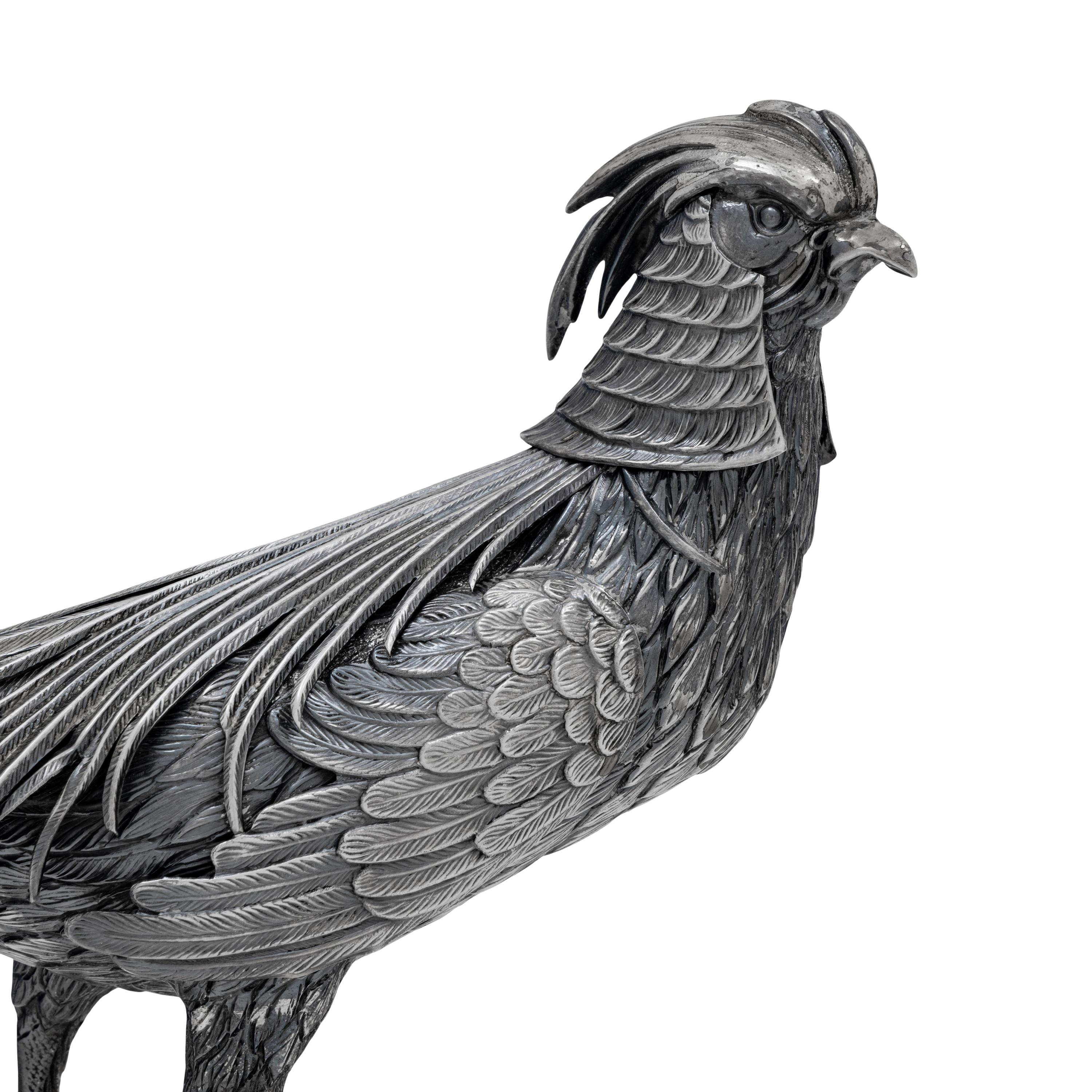 A Pair of Spanish Silver Pheasant Table Ornaments