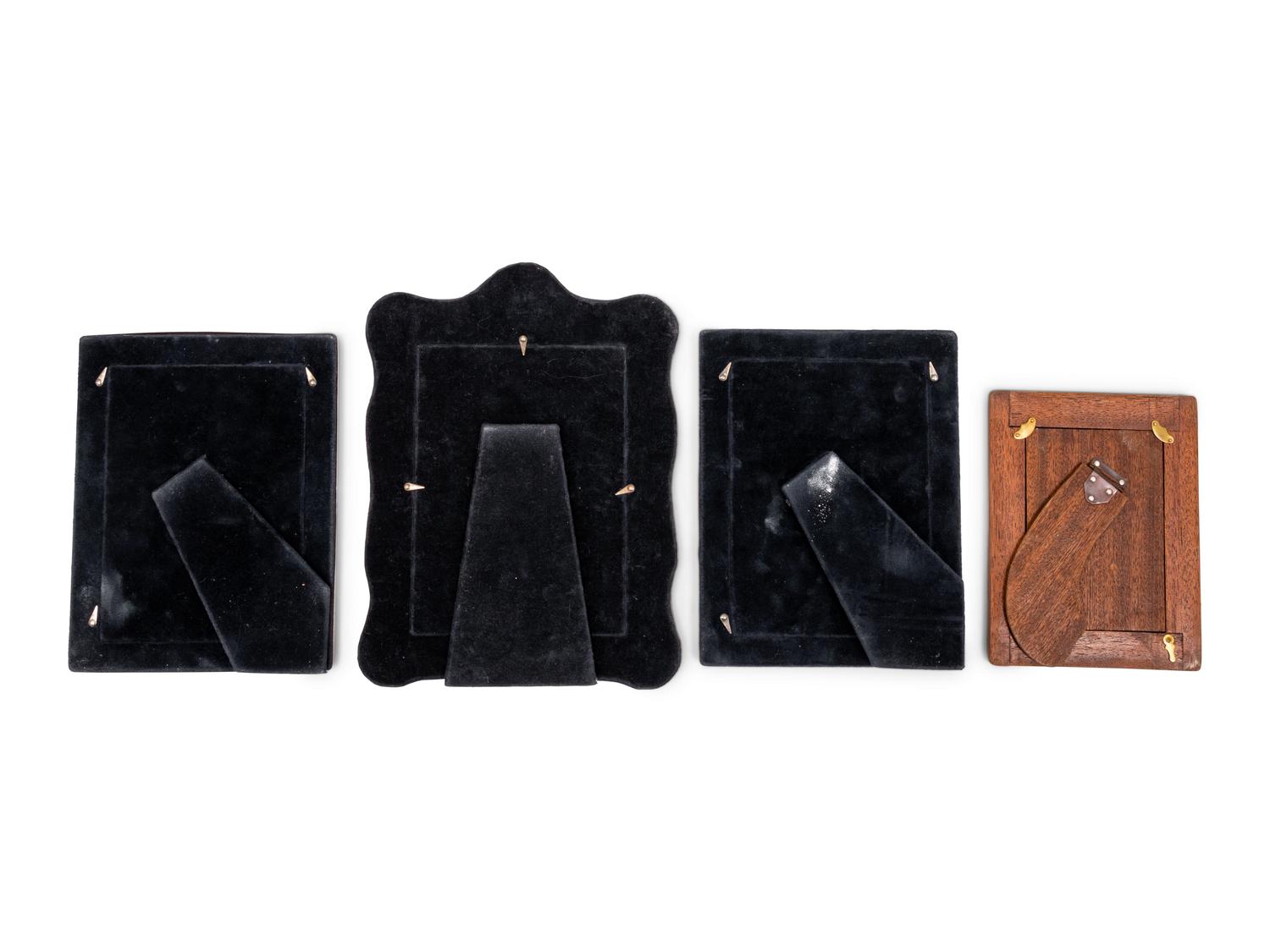 A Group of Four John Bull Ltd. Silver Picture Frames