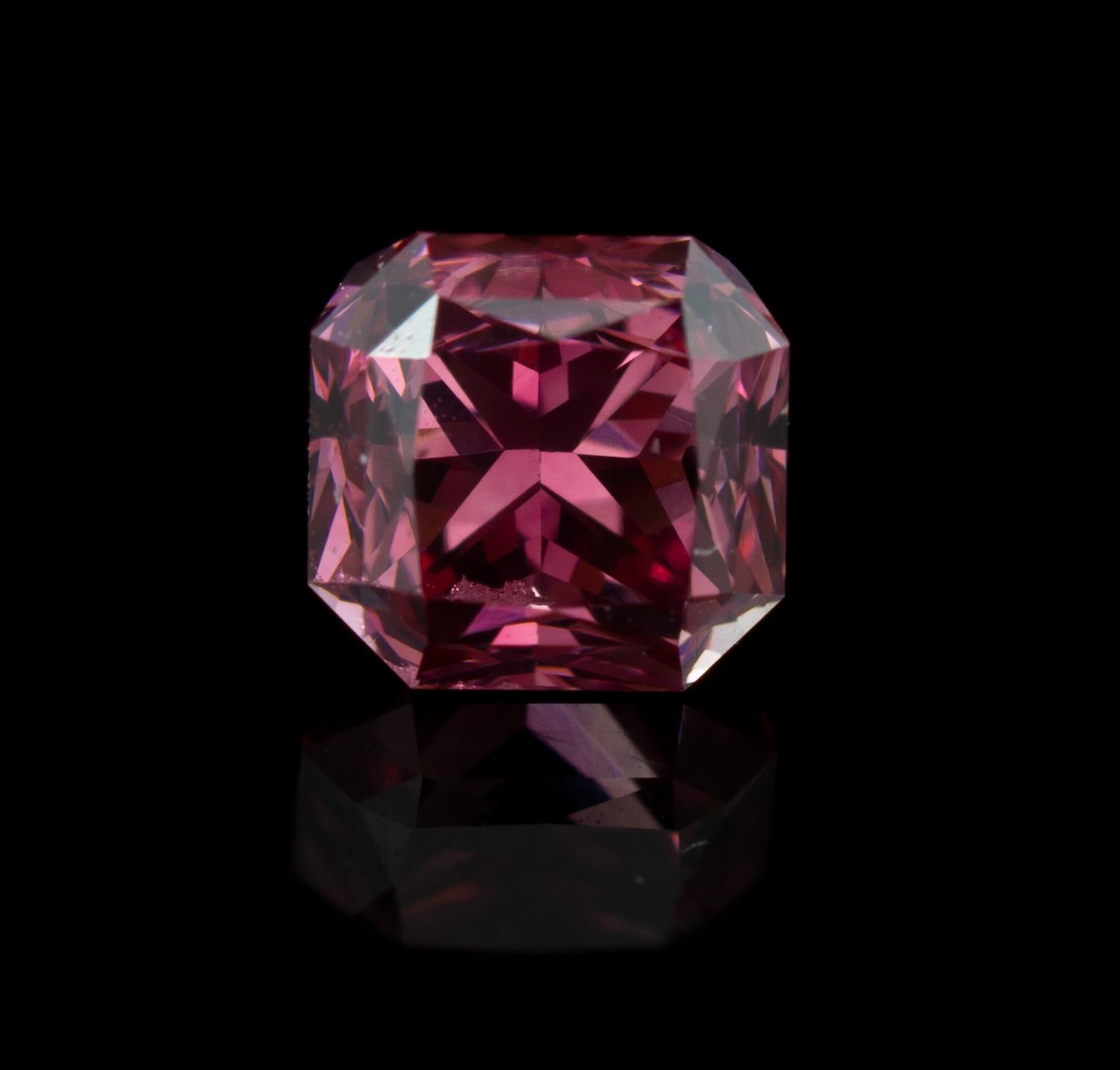 A 0.52 Carat Radiant Cut Fancy Deep Pink Diamond,