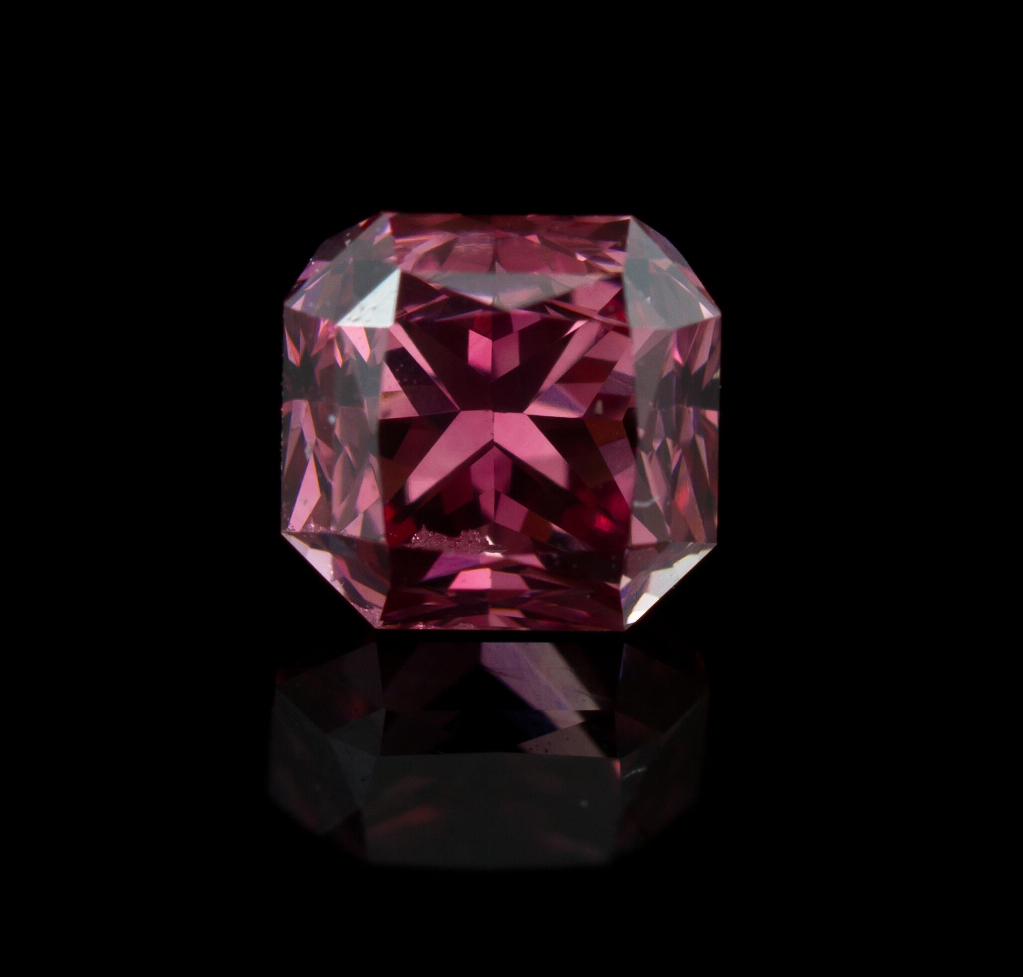 A 0.52 Carat Radiant Cut Fancy Deep Pink Diamond,