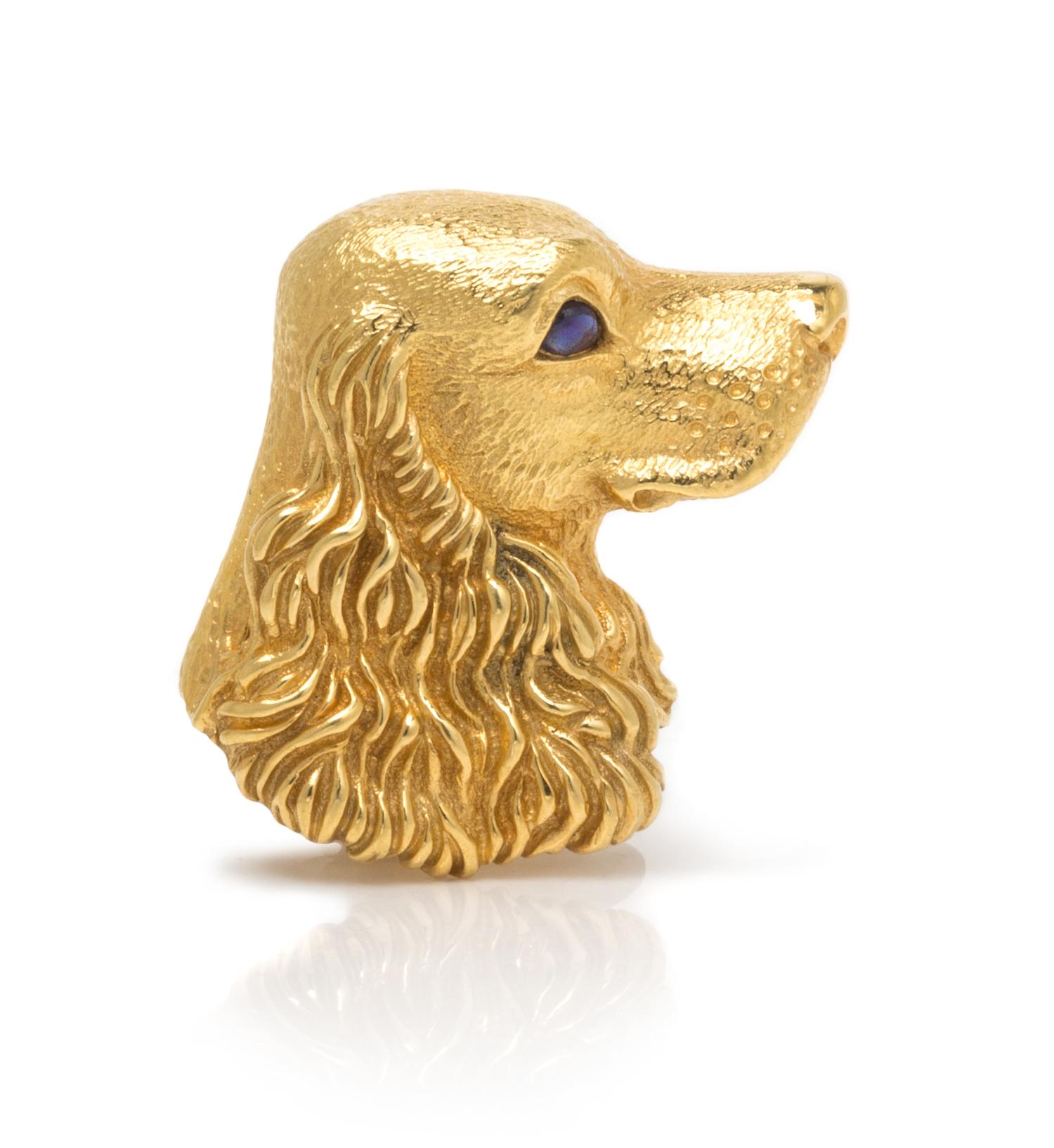An 18 Karat Yellow Gold and Sapphire Dog Brooch, Tiffany & Co., Circa 1989, 6.40 dwts.