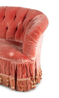 A Button-Tufted Velvet Reniform Sofa